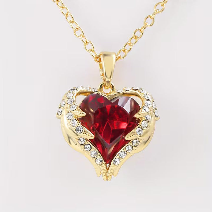 Gold Necklace Gobnait with Ruby Heart and Angel Wings
