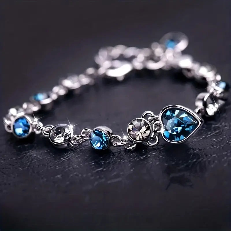 Silver Charm Bracelet Caoimhe with Blue Crystal Heart