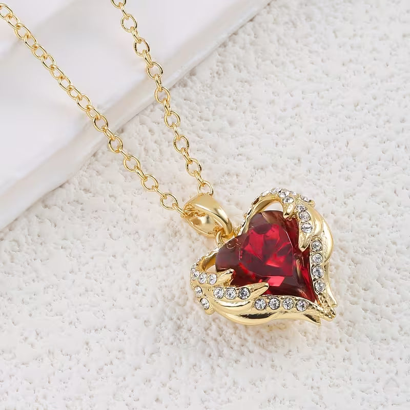 Gold Necklace Gobnait with Ruby Heart and Angel Wings