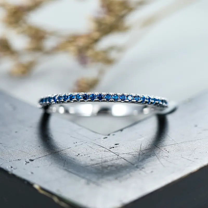 Silver Half-Eternity Ring Éabha with Sapphire
