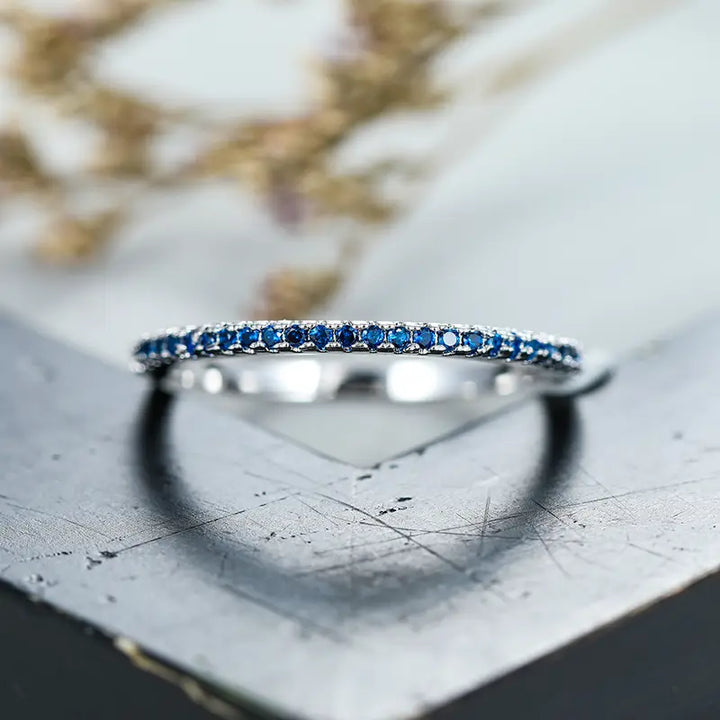 Silver Half-Eternity Ring Éabha with Sapphire