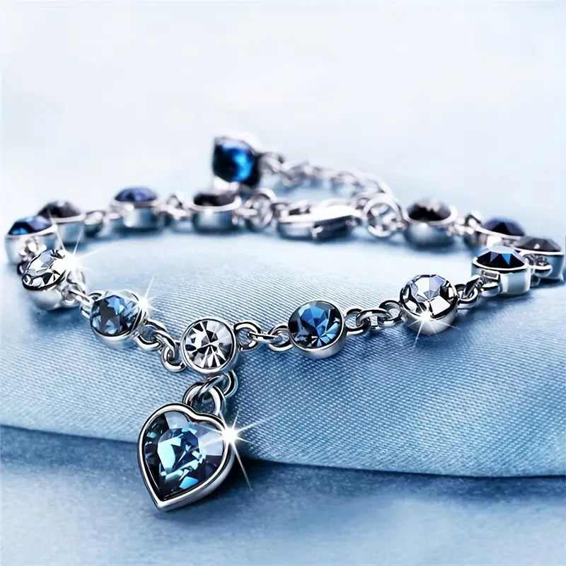 Silver Charm Bracelet Caoimhe with Blue Crystal Heart