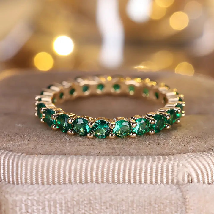 Gold Eternity Ring Clíona with Emerald