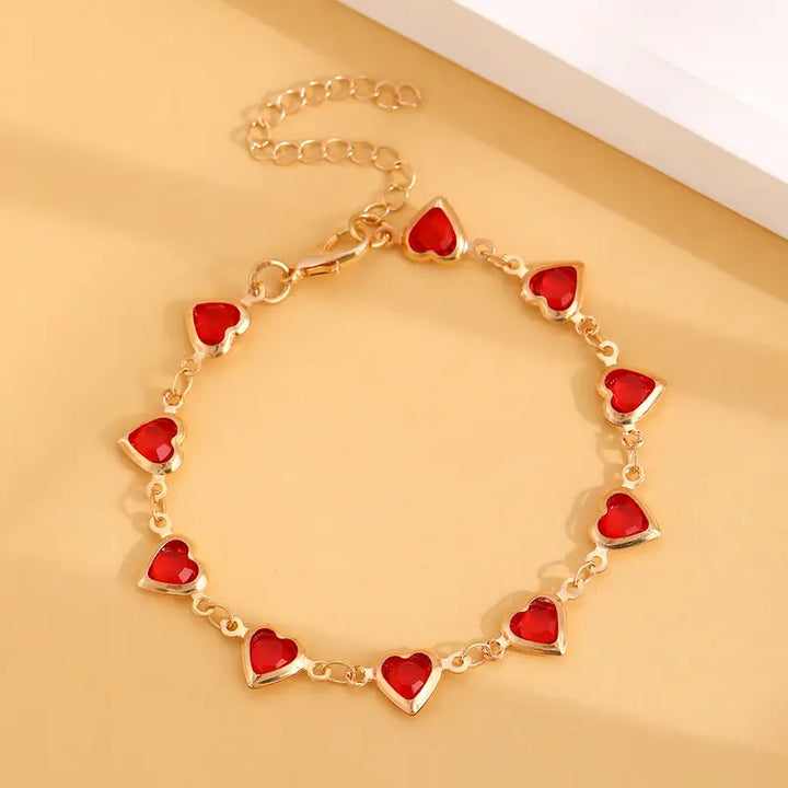 Gold Link Bracelet Aislinn with Ruby Hearts