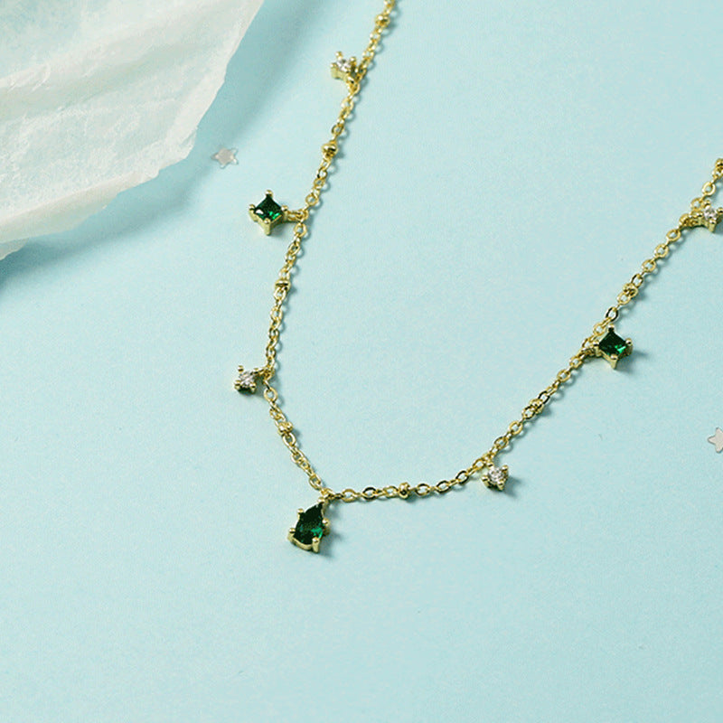 Gold Charm Necklace Eithne with Emeralds
