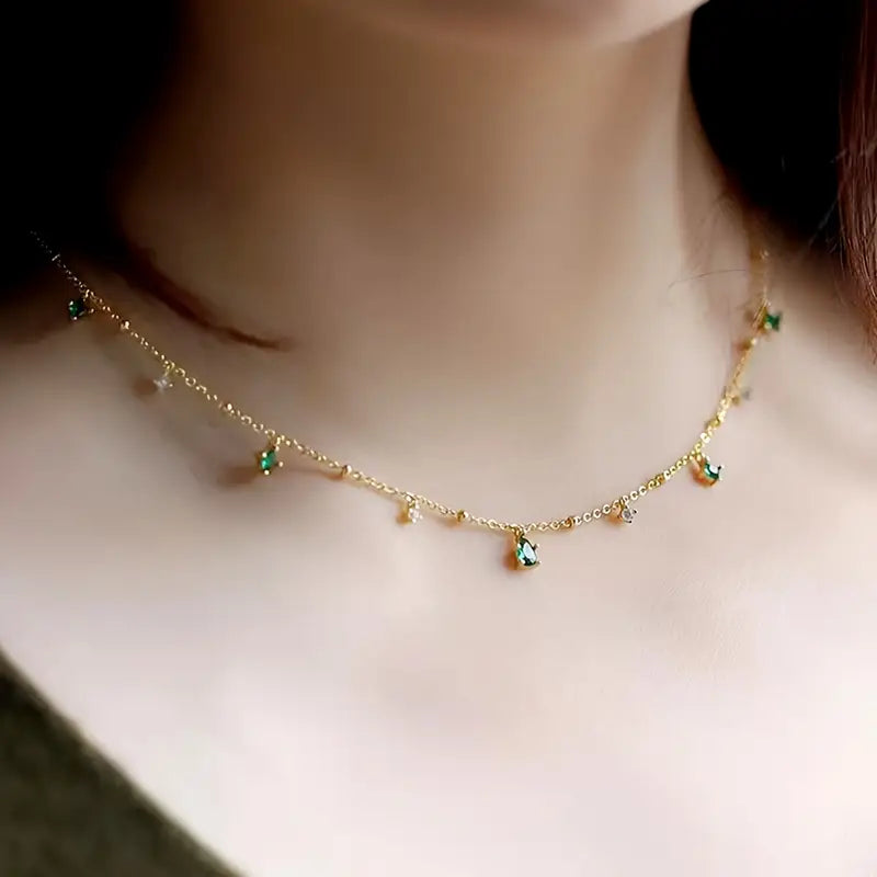 Gold Charm Necklace Eithne with Emeralds
