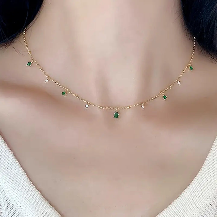 Gold Charm Necklace Eithne with Emeralds