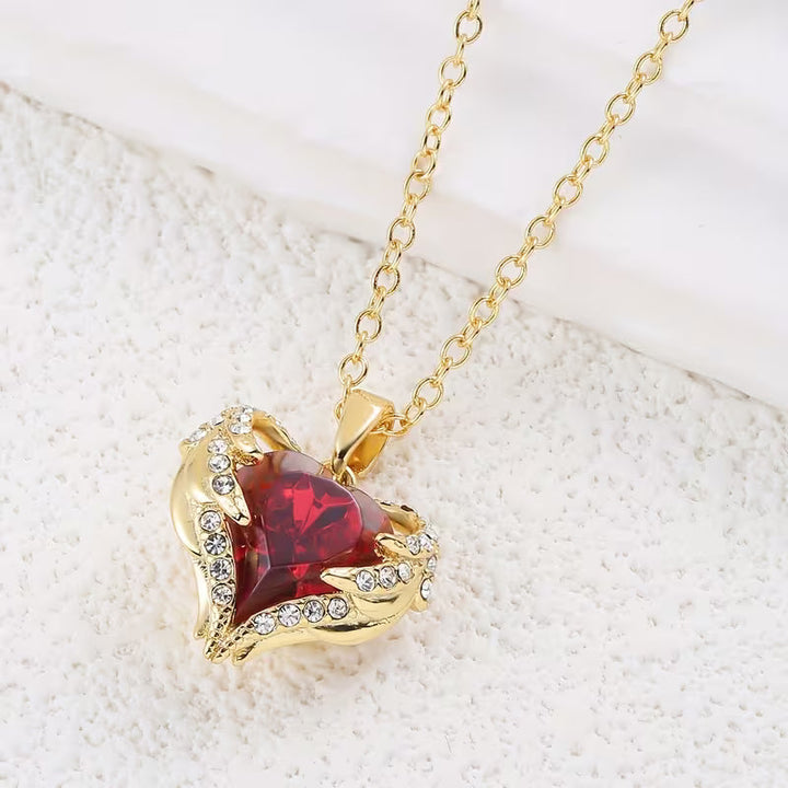 Gold Necklace Gobnait with Ruby Heart and Angel Wings