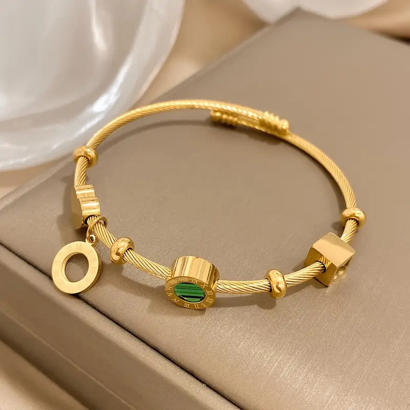 Gold Charm Bracelet Caoimhe with Emerald