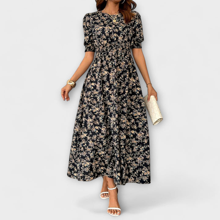 Amelia - Rotes Kleid mit Rundhalsausschnitt und Blümchen