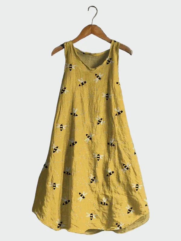 Senfgelbes Kleid mit Bienenmuster