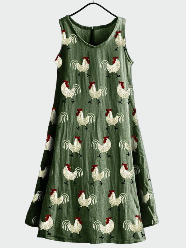 Grünes Kleid mit Hühnermuster
