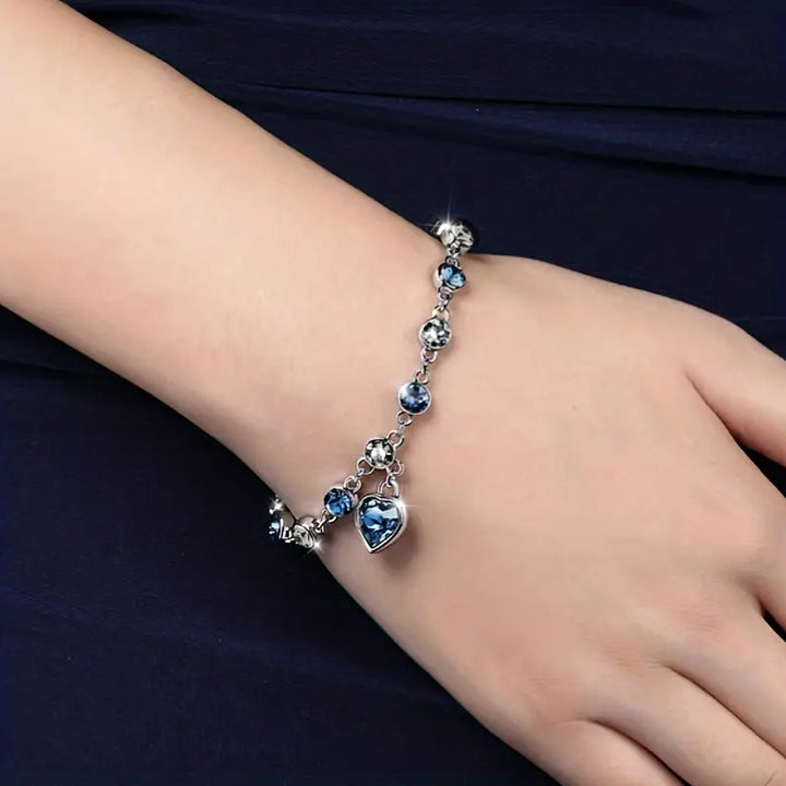 Silver Charm Bracelet Caoimhe with Blue Crystal Heart