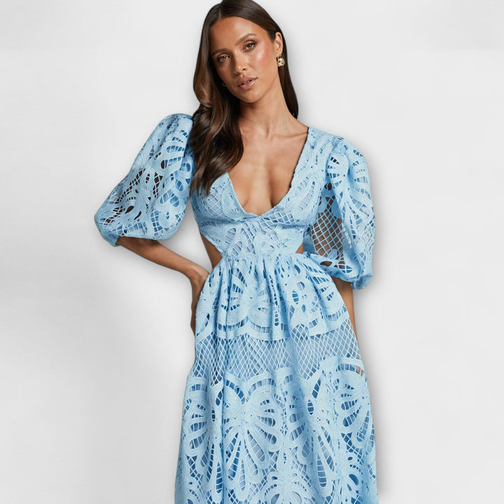 Elegantes gelbes Kleid mit Spitzenärmeln