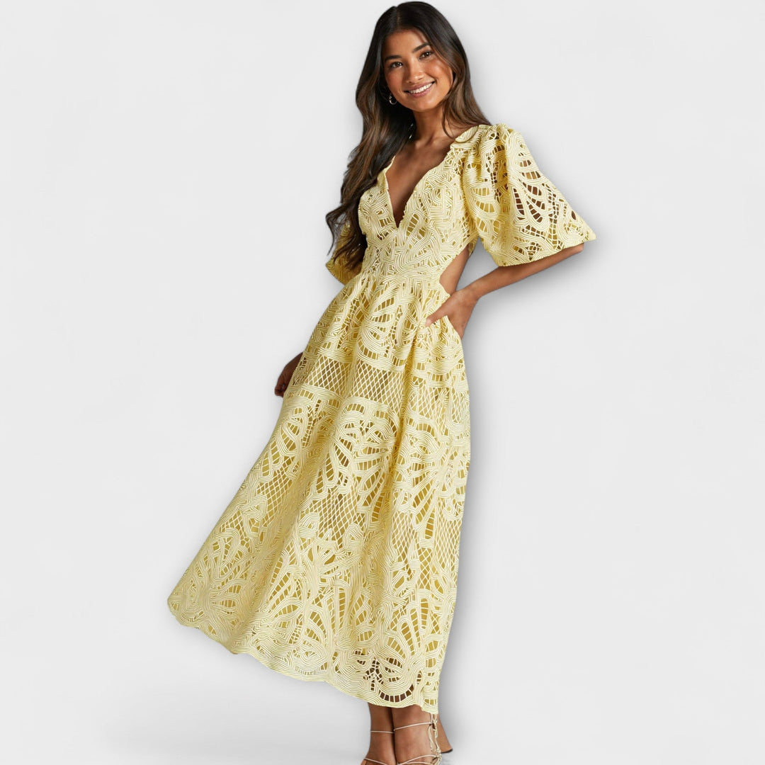Elegantes gelbes Kleid mit Spitzenärmeln