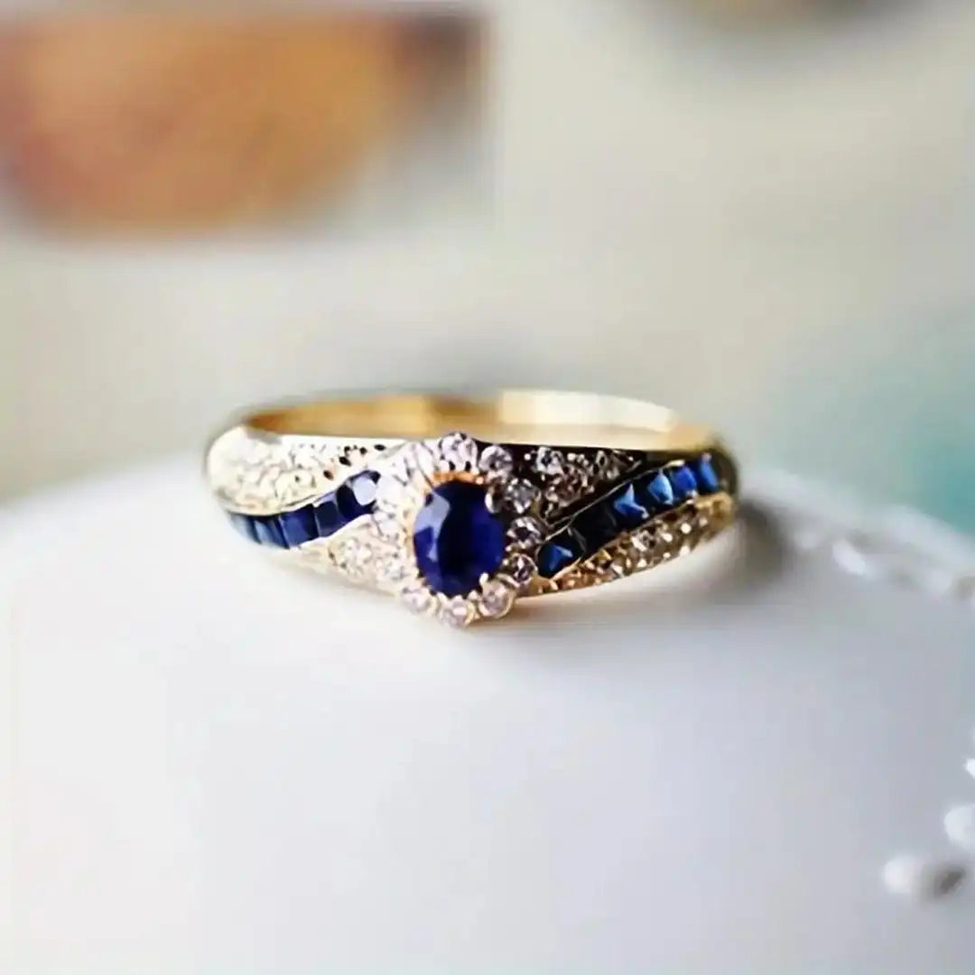 Gold Ring Eabha with Blue Sapphire