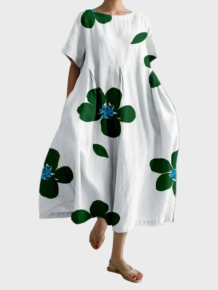 Weisses Kleid mit grünen Blüten