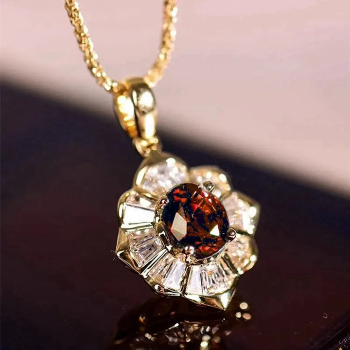 Gold Necklace Órlaith with Ruby Blossom