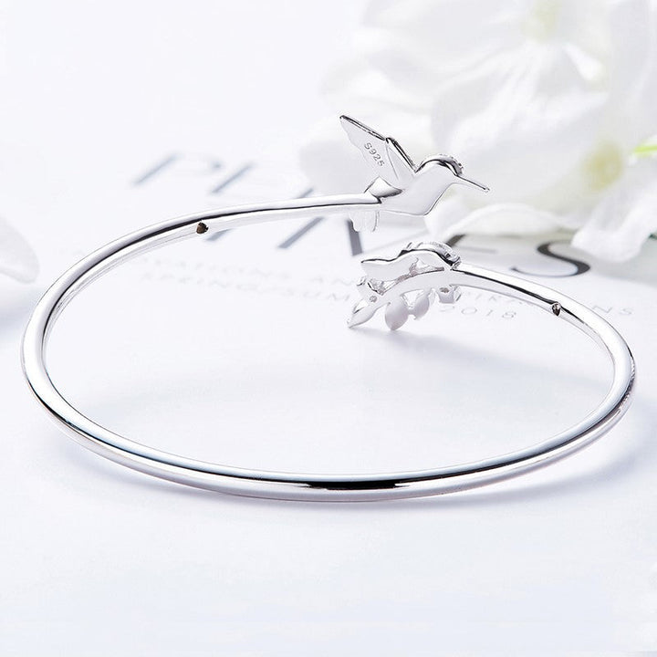 Silver Adjustable Ring with Emerald Hummingbird
