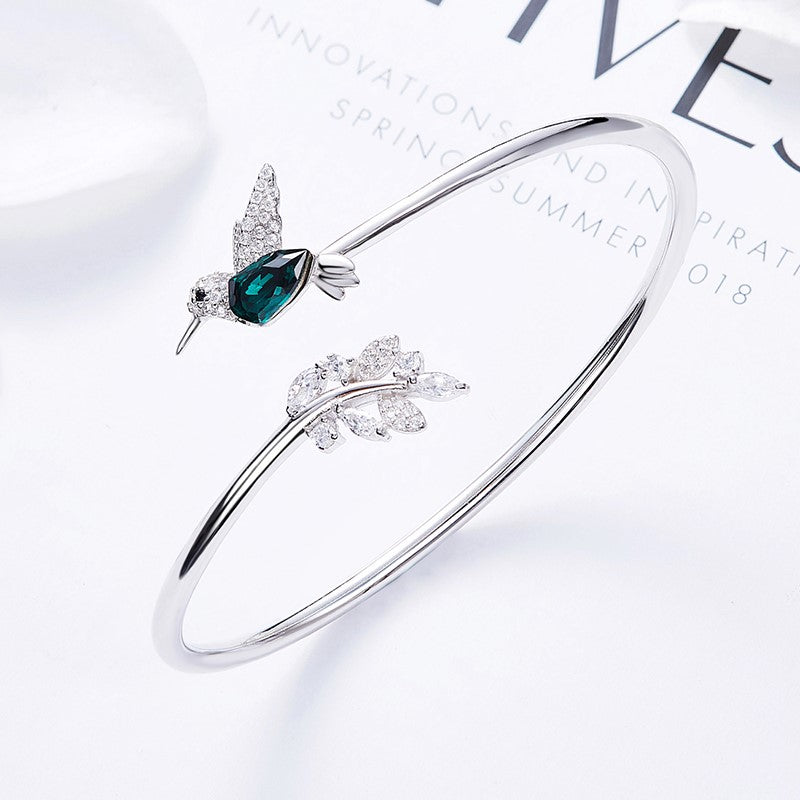 Silver Adjustable Ring with Emerald Hummingbird