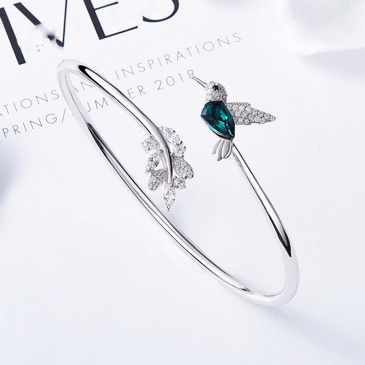 Silver Adjustable Ring with Emerald Hummingbird