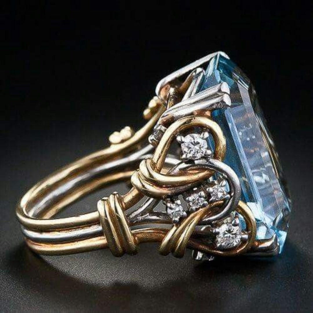 Gold & Silver Ring Bláthnaid with Blue Zircon