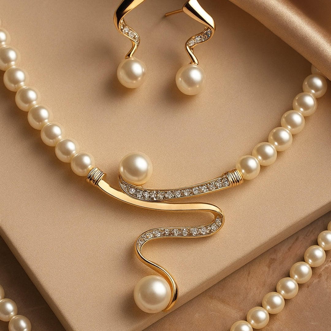Gold Drop Earrings with Pearl and Serpentine Swirl