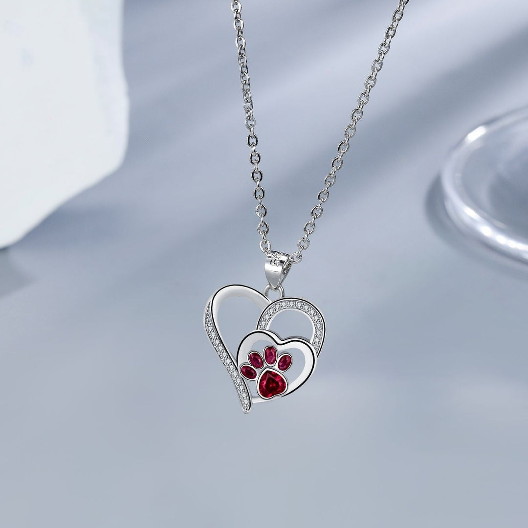 Silver Necklace Fionnuala with Ruby Paw Print Heart