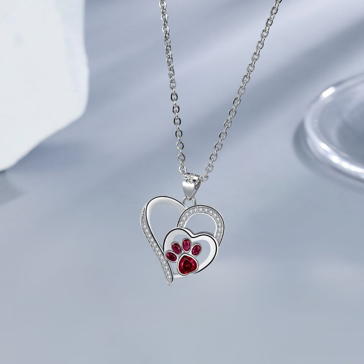 Silver Necklace Fionnuala with Ruby Paw Print Heart
