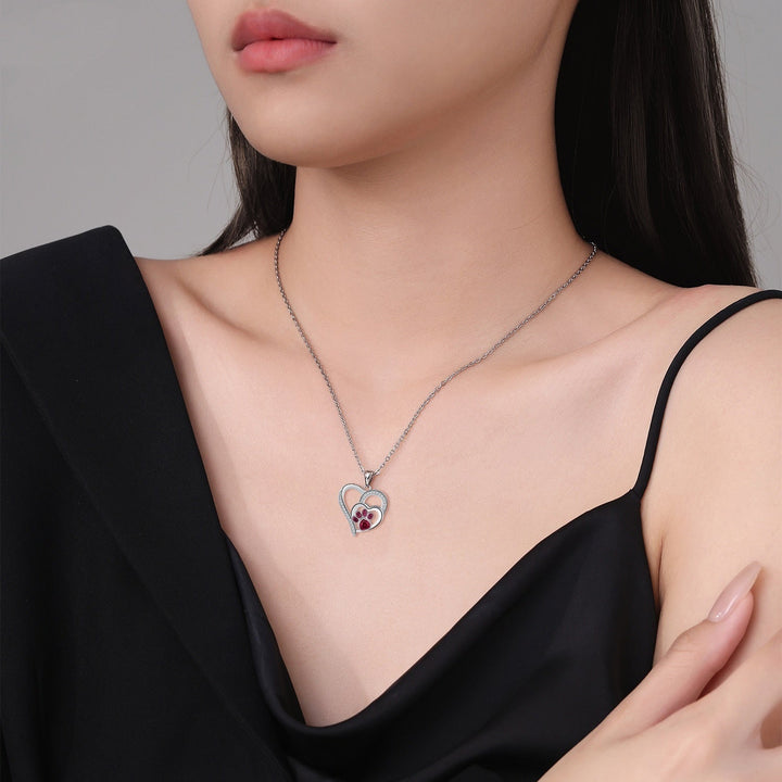 Silver Necklace Fionnuala with Ruby Paw Print Heart