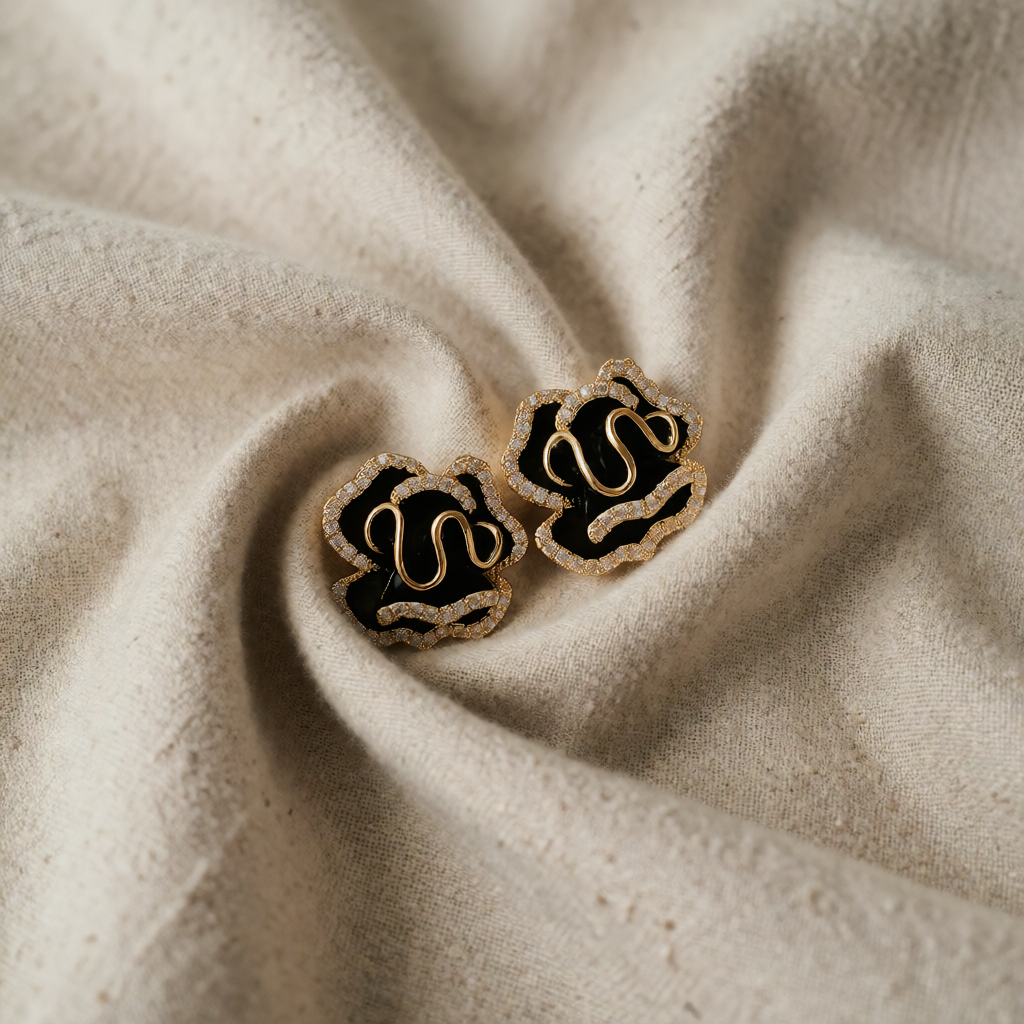 Gold Stud Earrings Órlaith with Black Lotus Flower