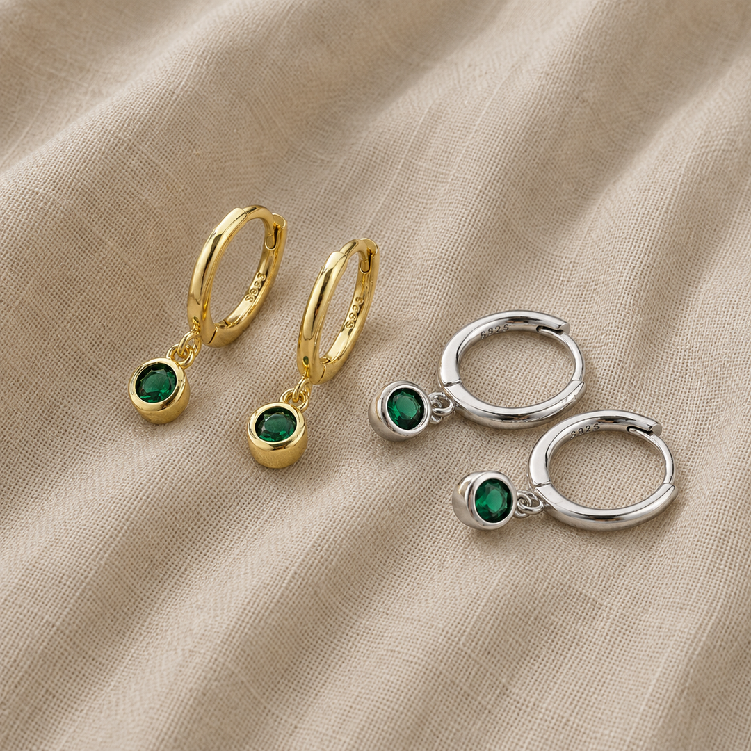 Gold Huggie Earrings Fiadh with Green Zirconia