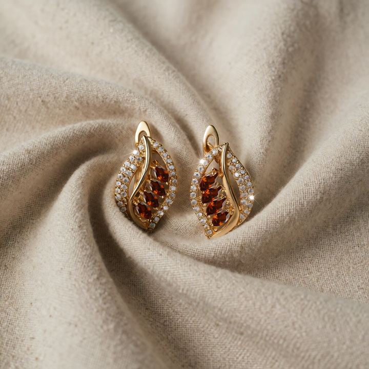 Gold Drop Earrings Ciara with Garnet Leaf Design