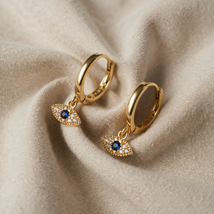 Gold Drop Earrings Íde with Sapphire Eye