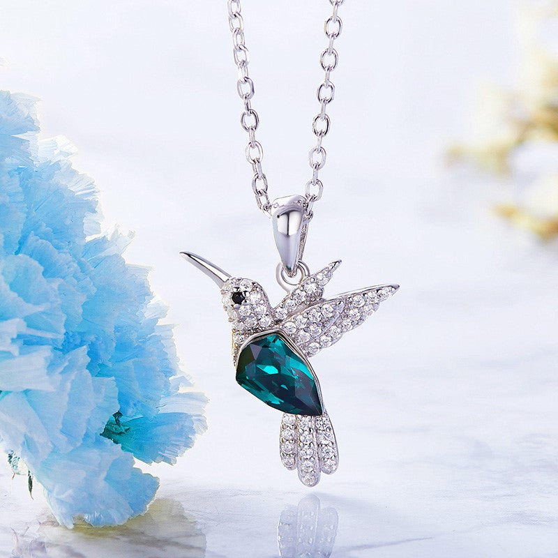 Silver Necklace Méadhbh with Hummingbird and Sapphire