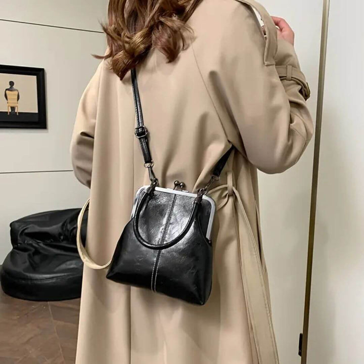 Amelias zeitloser Kiss Lock | Vintage Handtasche