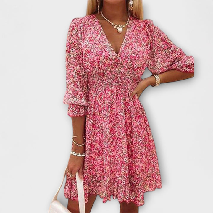 Pinkes Puffärmelkleid mit Blütenmuster