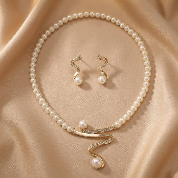 Gold Drop Earrings with Pearl and Serpentine Swirl