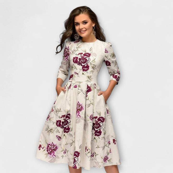 Retrozo - Cremefarbenes knielanges Kleid mit Blüten