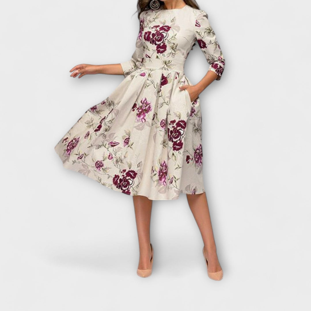Retrozo - Cremefarbenes knielanges Kleid mit Blüten