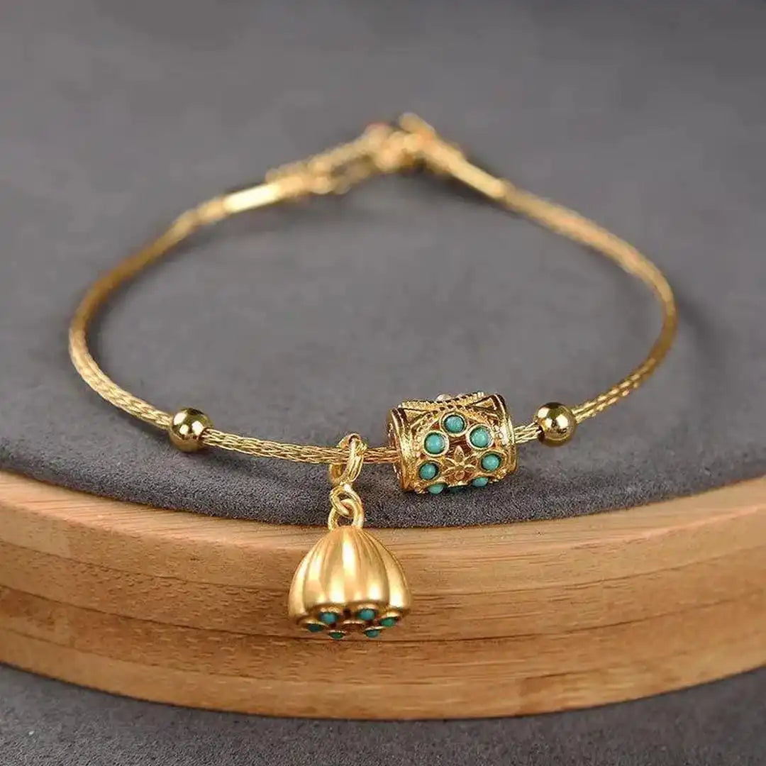 Gold Bangle Treasa with Turquoise Flower Charms