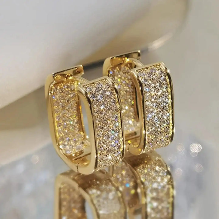Gold Huggie Earrings Aisling with Zirconia