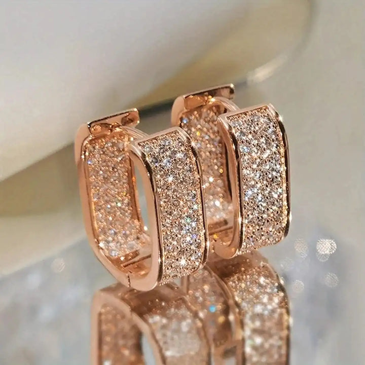 Gold Huggie Earrings Aisling with Zirconia