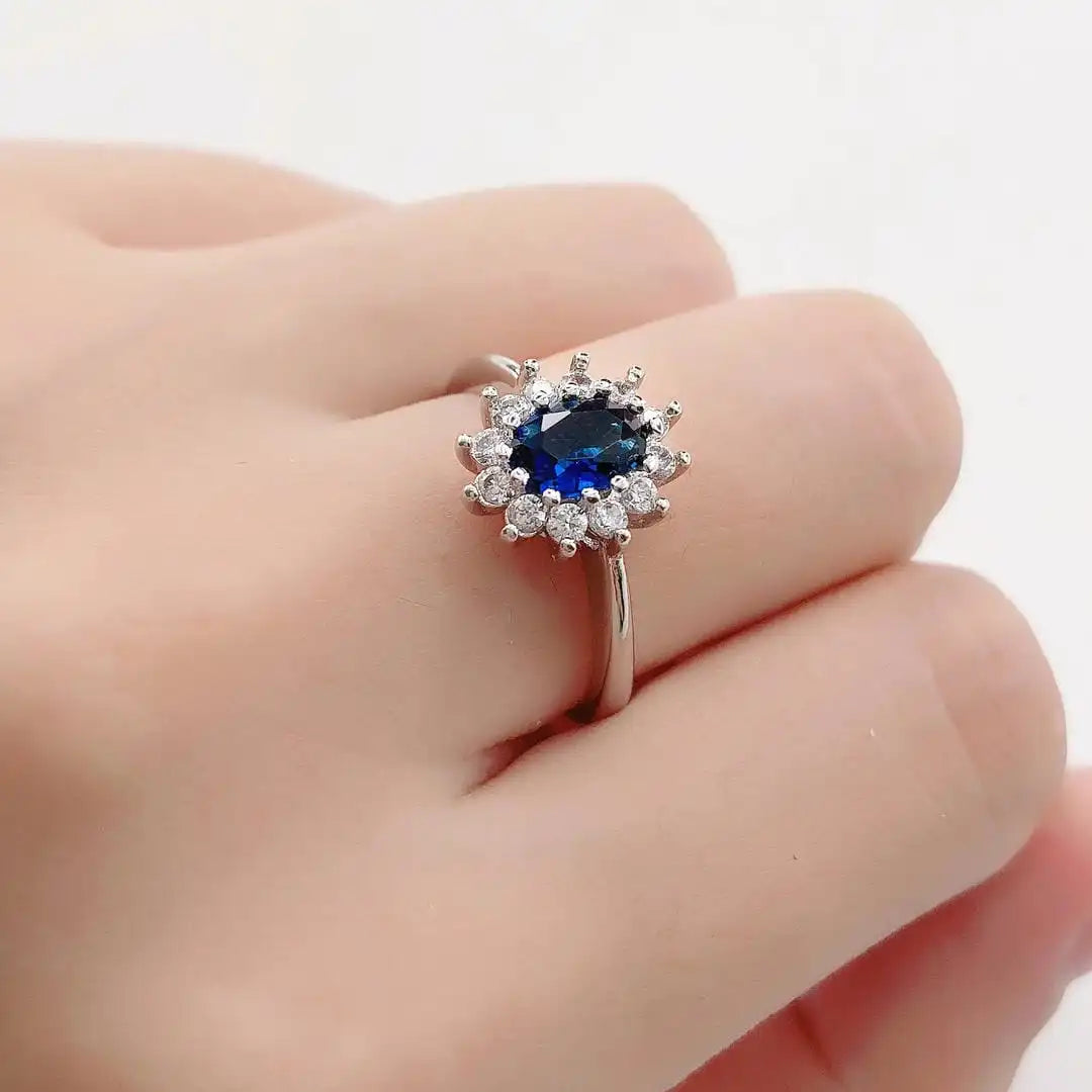 Gold & Silver Halo Ring Clíodhna with Ruby & Sapphire