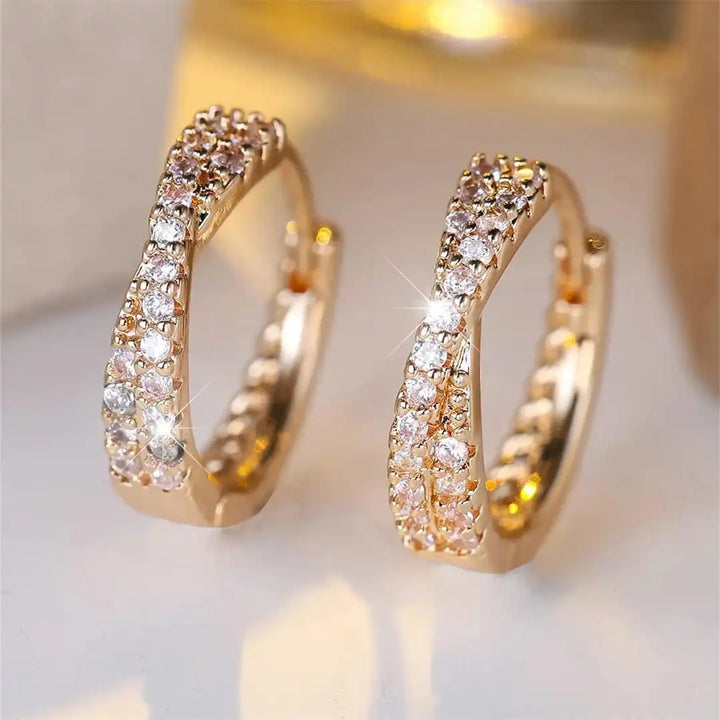 Gold Huggie Earrings Niamh with Zirconia