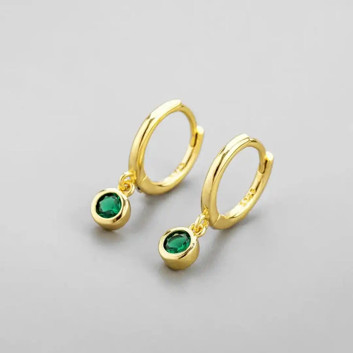 Gold Huggie Earrings Fiadh with Green Zirconia