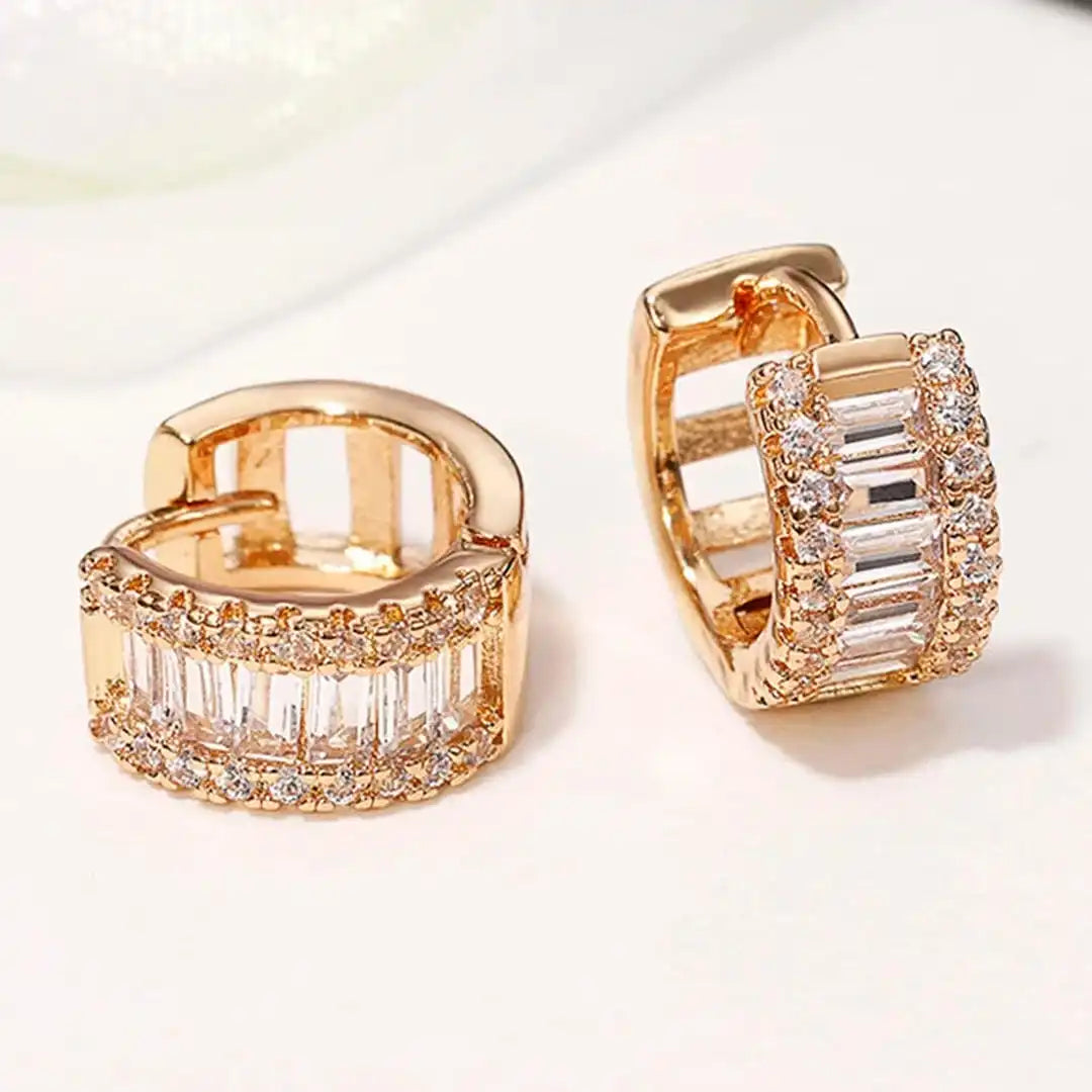 Gold Huggie Earrings Deirdre with Baguette Zirconia