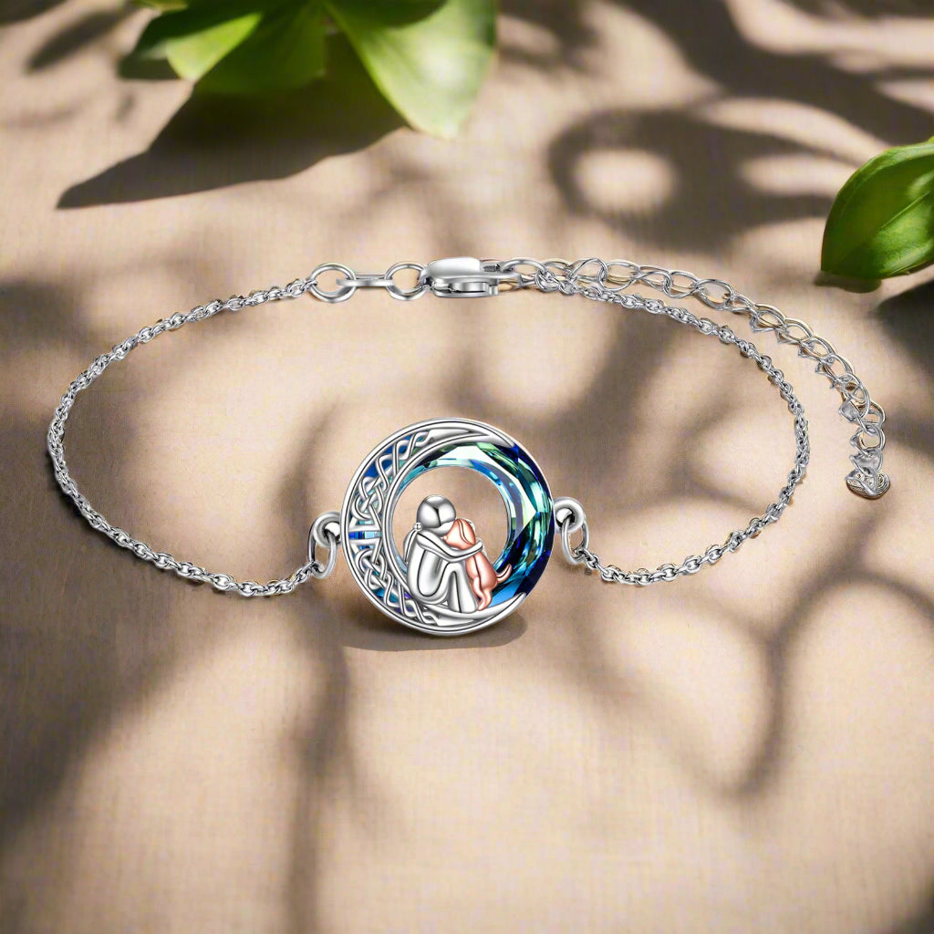 Silver Bracelet with Person Hugging Dog on Celtic Moon