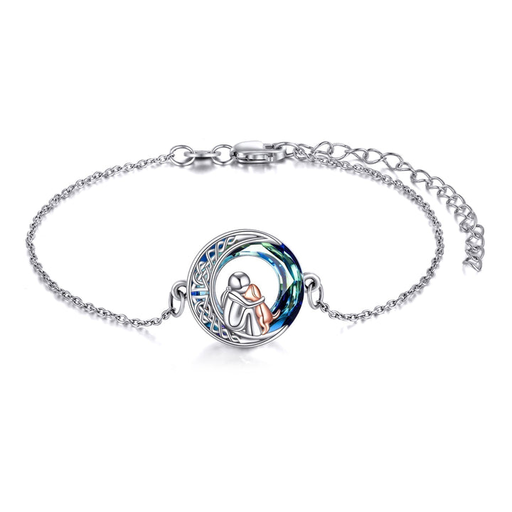 Silver Bracelet with Person Hugging Dog on Celtic Moon