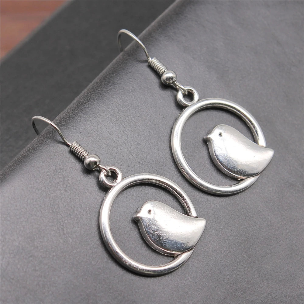 Antique Gold Drop Earrings Órlaith with Bird Motif
